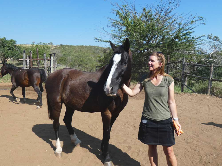 Karrie Hovey in her naturalist role, with horse